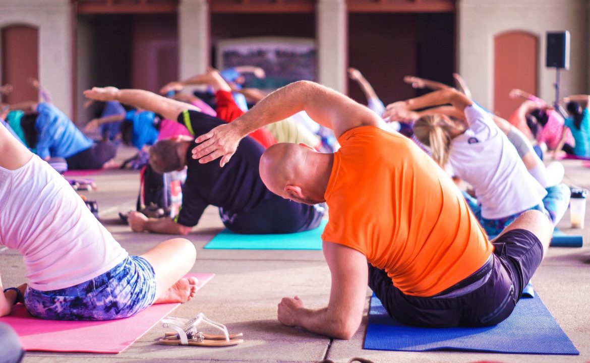 Group of People Stretching